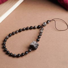 Guardian Crystal Phone Wristlet, Natural Silver Obsidian & Dzi Bead Protective Strap - alternate angle view - Proyoo natural gemstone accessory