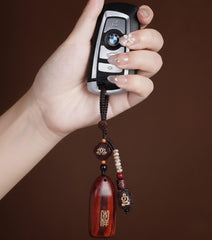 Artisan "All is Well" Wood Keychain - Premium Sandalwood Lotus Amulet for Good Fortune - detail close-up view - Proyoo Handmade
