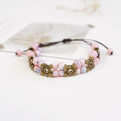 Boho Ceramic Bead Bracelet – Adjustable Woven Cord with Floral Charms