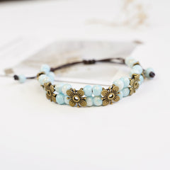 Boho Ceramic Bead Bracelet – Adjustable Woven Cord with Floral Charms