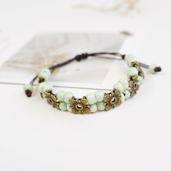 Boho Ceramic Bead Bracelet – Adjustable Woven Cord with Floral Charms
